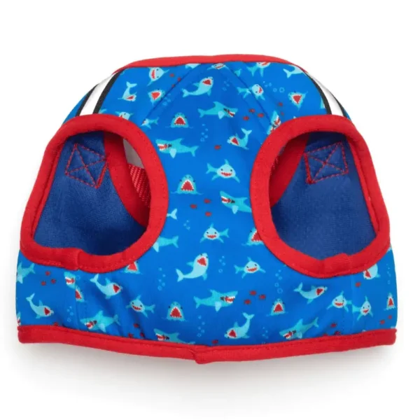 A blue pet harness featuring a pattern of sharks and red accents, and arm holes