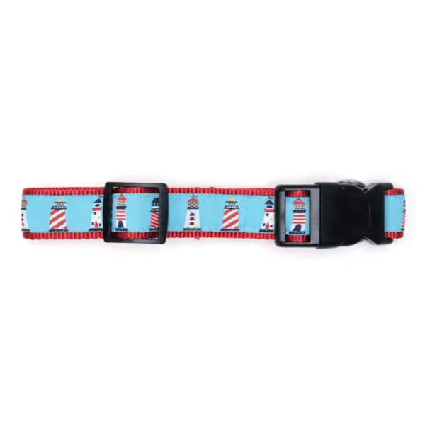 A dog collar featuring a blue background with red and white lighthouses.