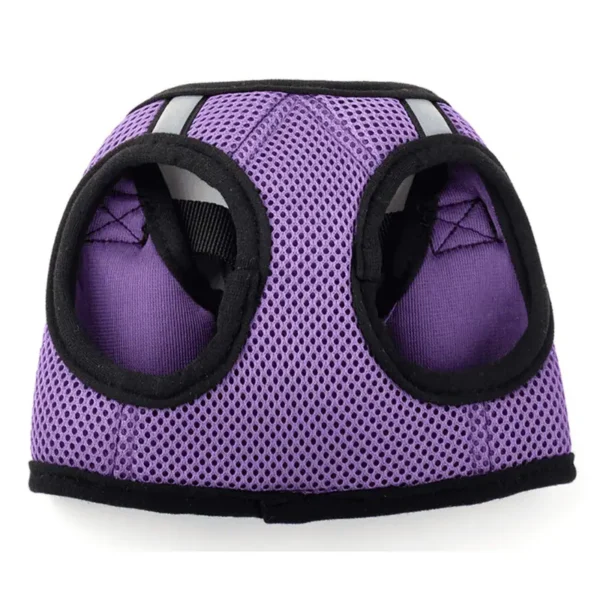 A purple dog harness with two holes for the dog's front legs and reflective accents.