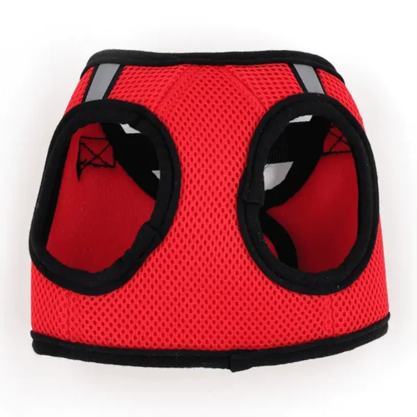A red mesh dog harness with openings for the dog's front legs and reflective straps.