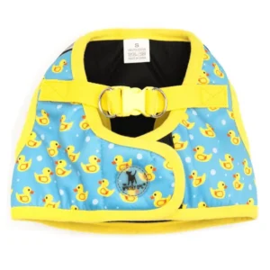 A blue dog harness with yellow trim, featuring a pattern of yellow rubber ducks on it.