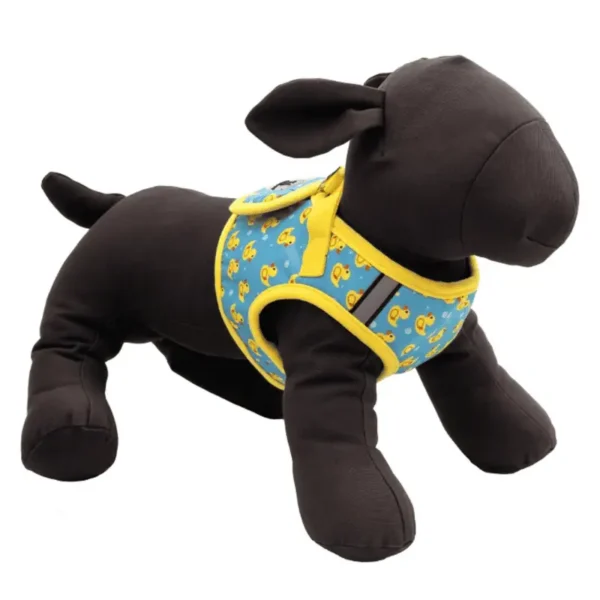 A plush dog mannequin in a blue and yellow harness.