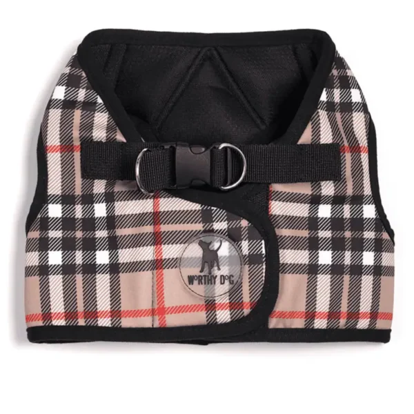 A plaid dog harness in shades of beige, black, and red with a buckle and the logo "WORTHY D.C." on it.