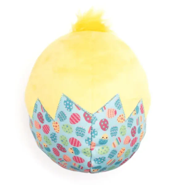 A plush dog toy shaped like a yellow chick with a patterned base resembling colorful eggs.