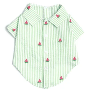 A green and white striped dog shirt with watermelon slice embroidery.