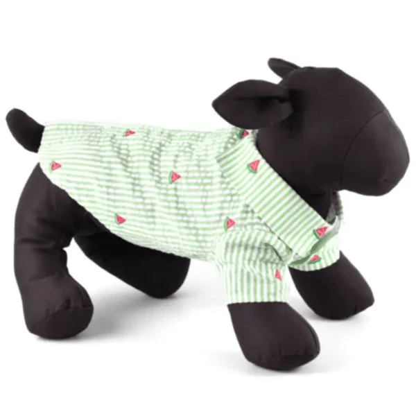 A plush dog mannequin wearing a green and white striped shirt with watermelon patterns.