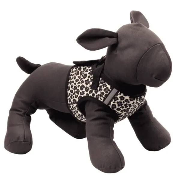 A plush dog mannequin wearing a leopard-print harness vest.