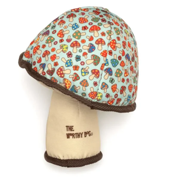 A colorful plush mushroom dog toy with a patterned cap and a beige stem, displaying whimsical designs.