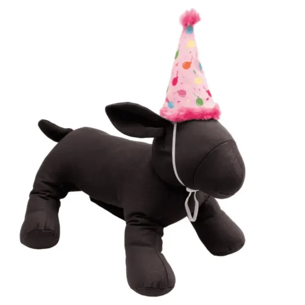 A black plush dog mannequin, wearing a colorful pink party hat.