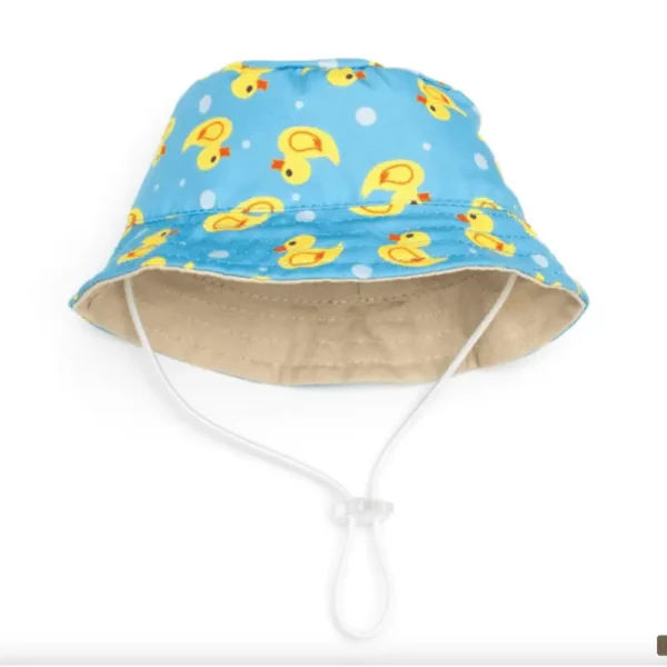 A blue bucket dog hat with a pattern of yellow ducks and white polka dots.