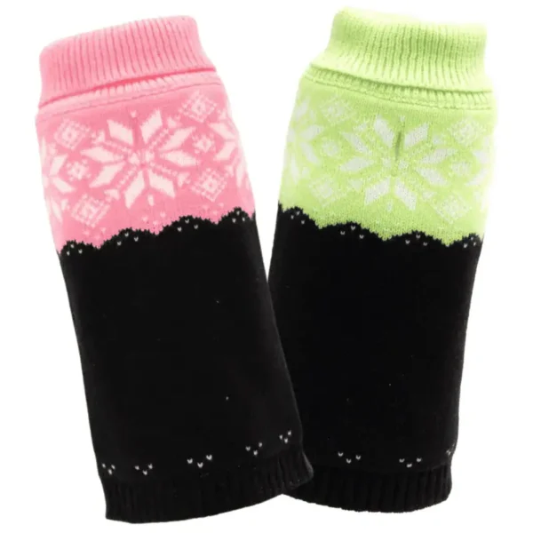 A pair of patterned dog sweaters featuring pink and green sections with snowflake designs, and a solid black lower portion.