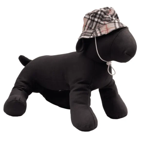 A black plush dog mannequin wearing a plaid bucket hat.