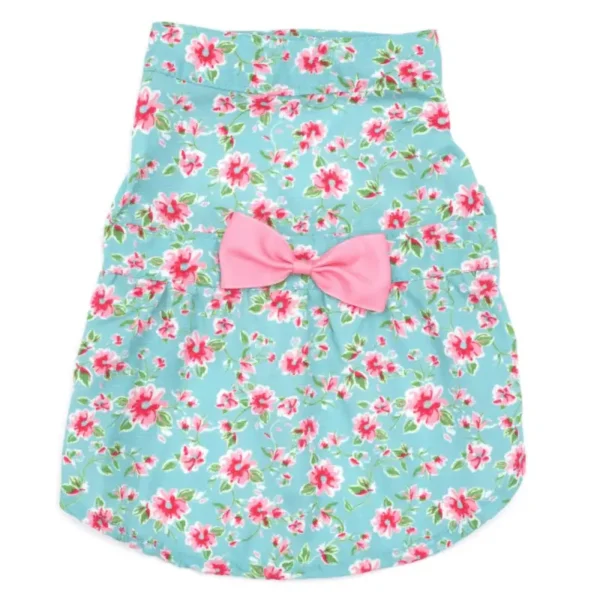 A light blue floral dog dress with a pink bow at the waist.