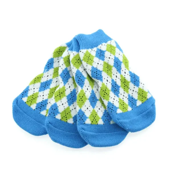 A set of colorful dog socks featuring a blue, green, and white diamond pattern.