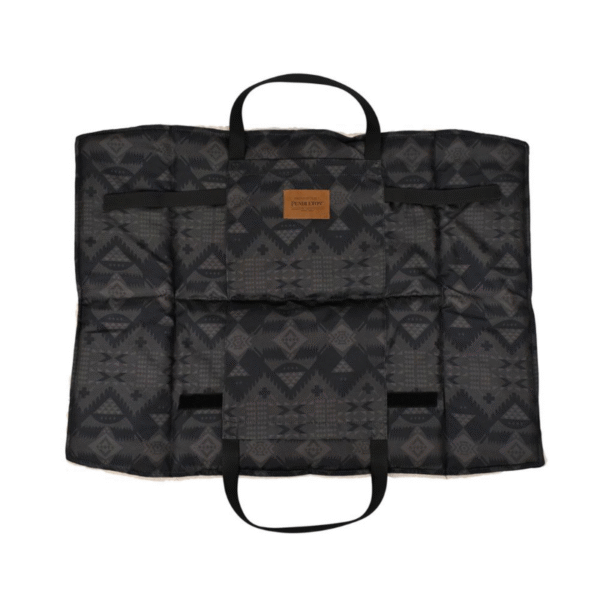 A black patterned bag or organizer with handles, featuring a geometric design.