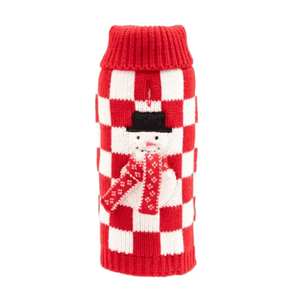A red and white checkered dog sweater with a snowman design and a red scarf.