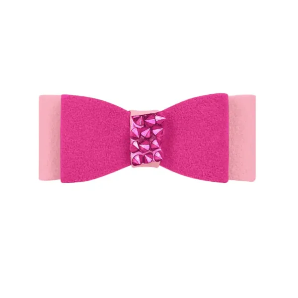 A pink and light pink dog bow hair clip with decorative crystal studs in the center.