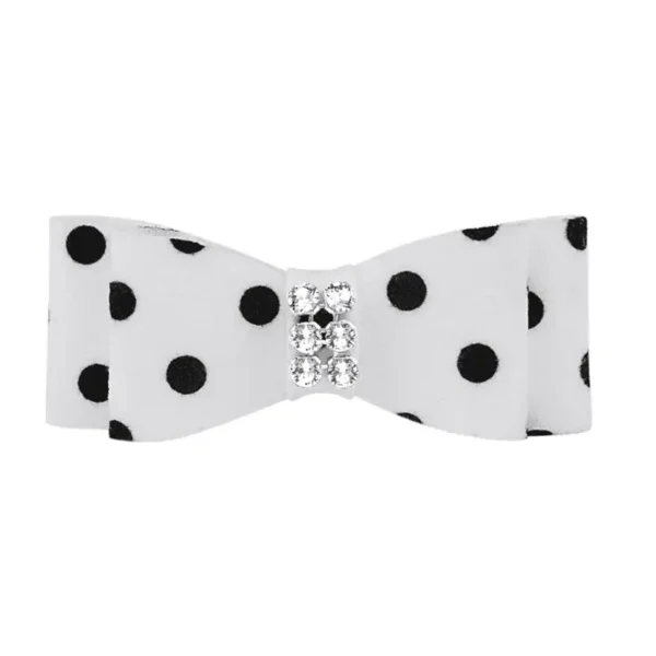 A white dog hair bow with black polka dots, featuring 6 mini rhinestones accent in the center.