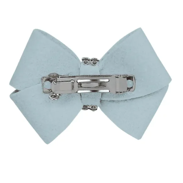 A light blue hair bow with a metal clasp on the back.