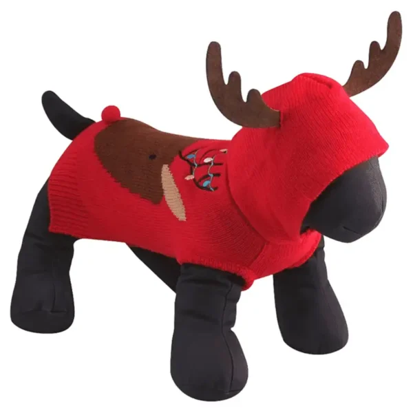 A plush dog mannequin wearing a red dog sweater with antlers.