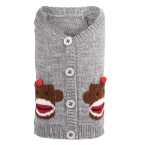 A gray cardigan sweater with buttons and playful sock monkey designs on the pockets.