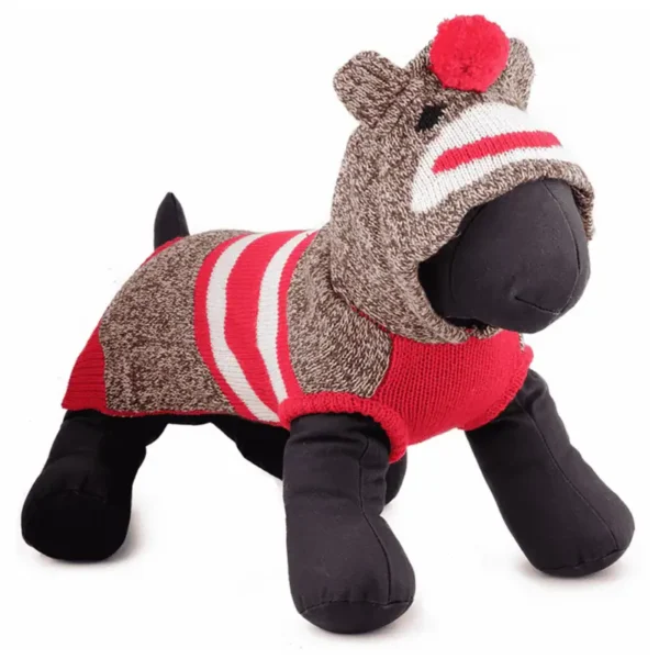 A plush dog mannequin dressed in a red and brown striped monkey sweater with a hood.
