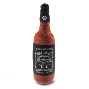 Brown plush whiskey bottle dog toy with black label and Bark Daniels white text