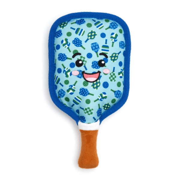 A cute, plush pickel ball dog toy with a smiling face, featuring a blue patterned exterior and a brown handle.