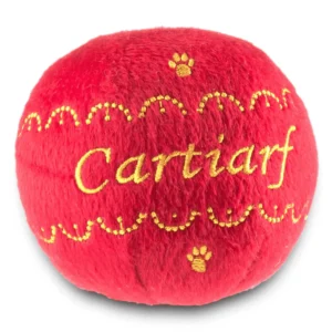 Red plush ball dog toy with gold designs, paw prints, and Cartiarf text