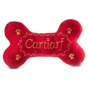 Red plush bone dog toy with gold designs, paw prints, and Cartiarf text
