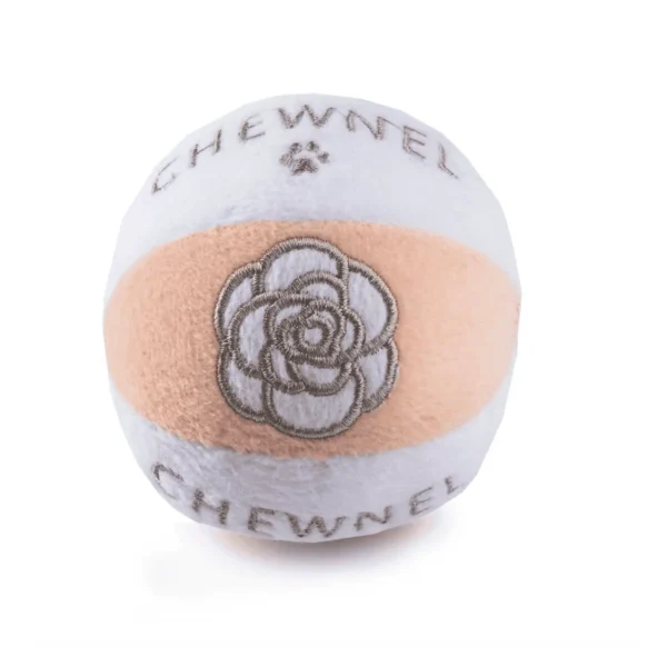 Blush and white plush ball dog toy with gray Chewnel text, paws, and flower