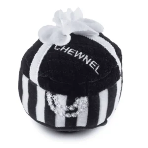 Plush black Chewnel Gift Box dog toy with white stripes, white ribbon, white flower, white “CHEWNEL” text, and white embroidered pearl accents. Soft squeaky toy for stylish pups
