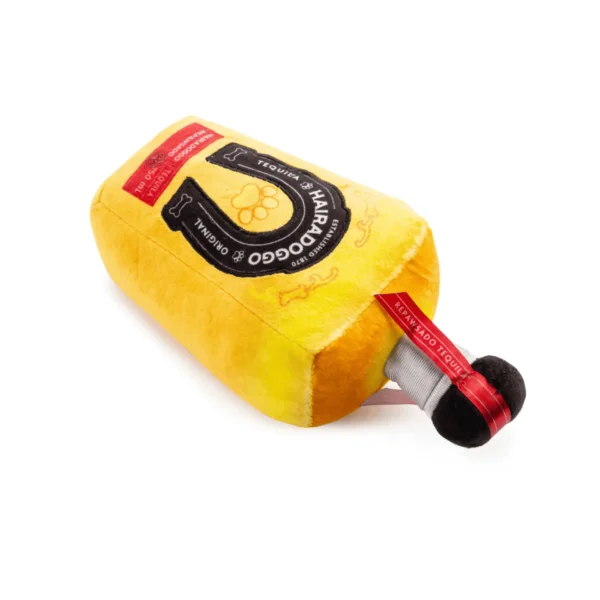 Plush tequila bottle dog toy lying flat with squeaker