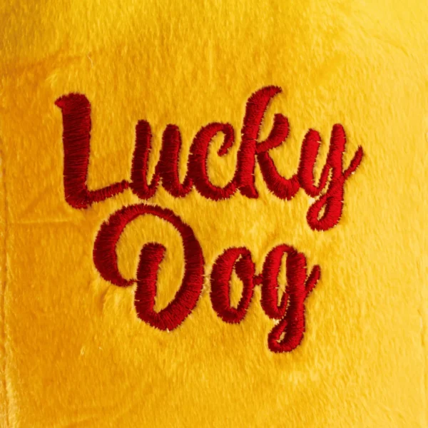 Plush tequila bottle dog toy close-up of embroidered ‘Lucky