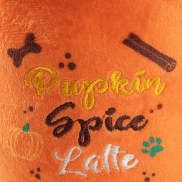 close-up of plush pumpkin spice latte mug dog toy