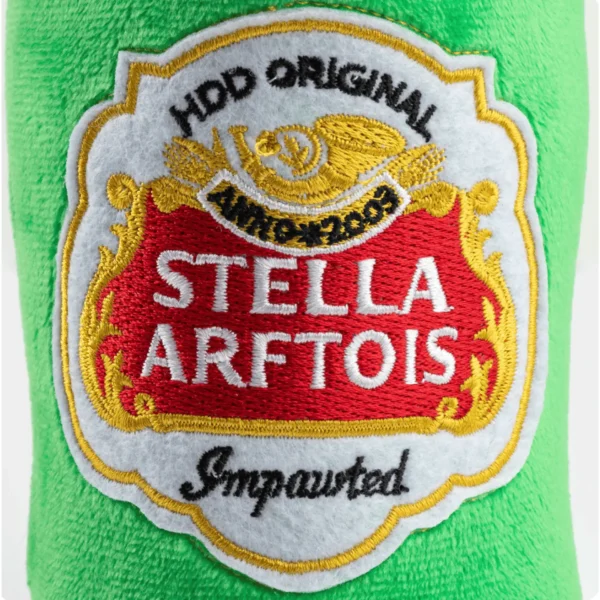 Stella Arftois close-up of plush beer bottle label dog toy