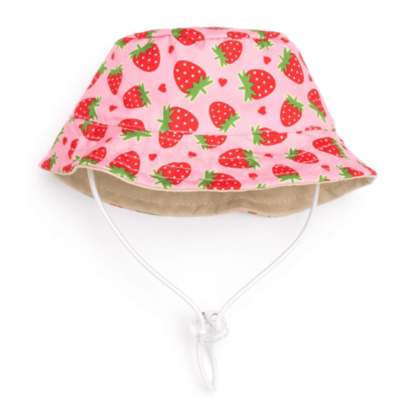 Pink dog bucket hat with strawberry print, elastic chin strap, and adjustable toggle for a comfy fit.