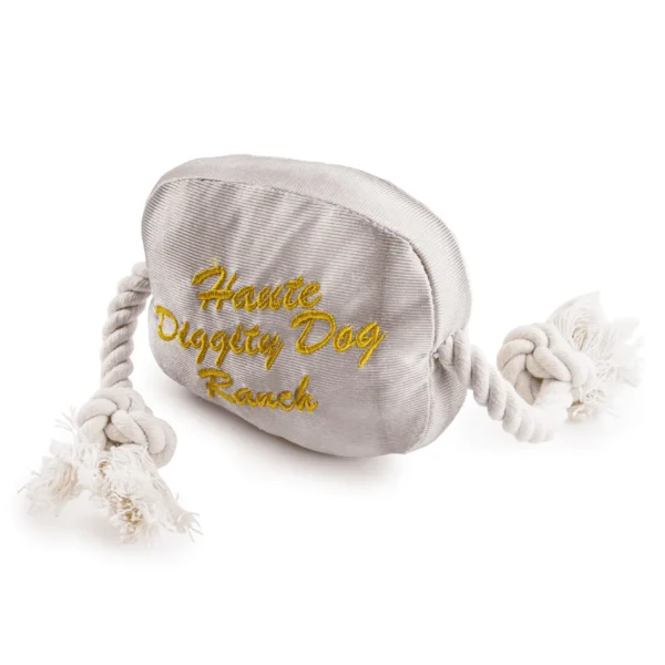 Western Belt Buckle Dog Toy – slanted back view of plush belt buckle with squeaker and rope sides