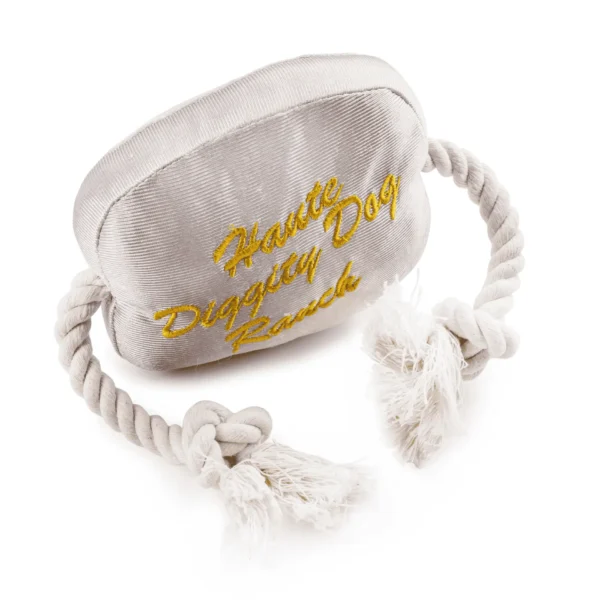 Western Belt Buckle Dog Toy – alternate view of slanted back view of plush belt buckle with squeaker and rope sides