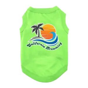 Green dog tank that says California Dreaming in blue font with a blue wave, orange sunset and green palm tree design