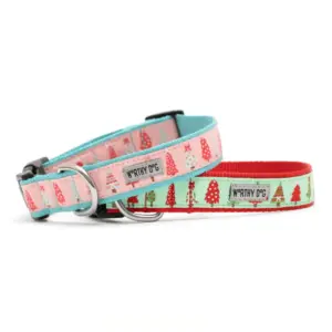 Festive Christmas dog collars in pink and mint with holiday tree designs, shown side by side.