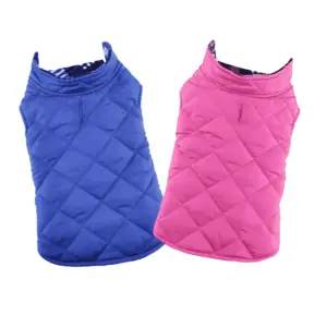 Two coats, a blue Reversible fleece-lined puffer coat and a pink Reversible fleece lined puffer coat